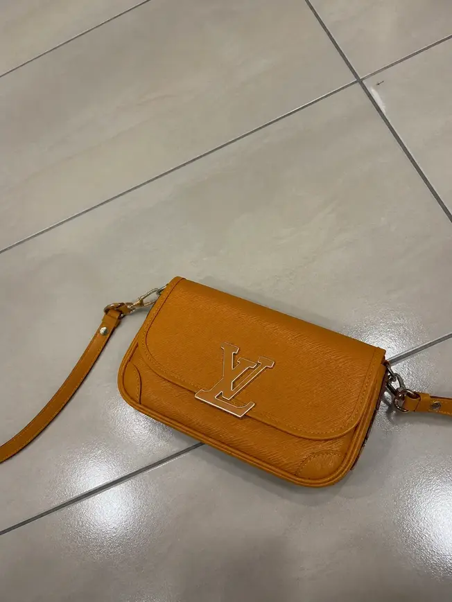 Epi Buci Crossbody Bag M59459 photo review