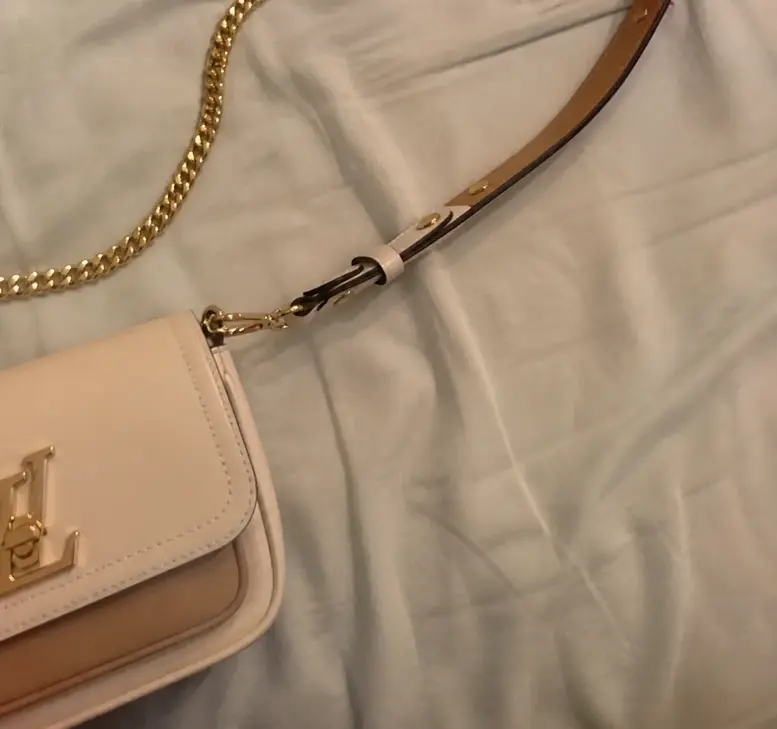 Grained Calf Leather Lockme Tender M59733 photo review