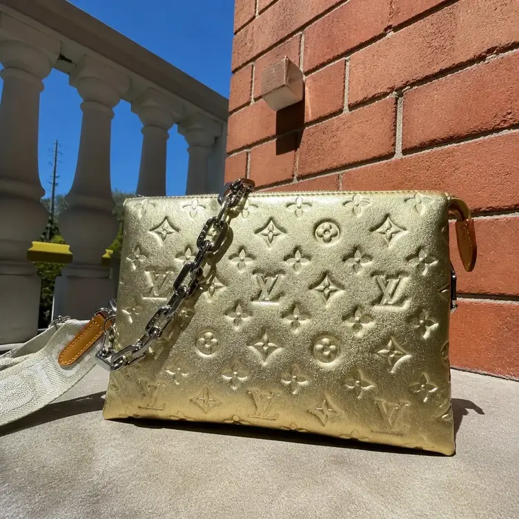 Monogram Embossed Puffy Coussin PM Handbag M59278 photo review
