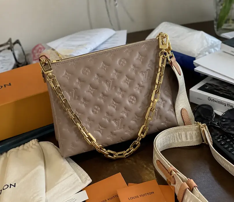 Monogram Embossed Puffy Coussin PM Handbag M59277 photo review