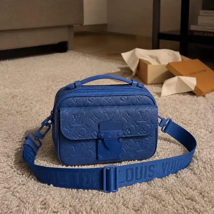 Monogram Embossed Taurillon Leather S Lock Messenger-Blue M58488 photo review