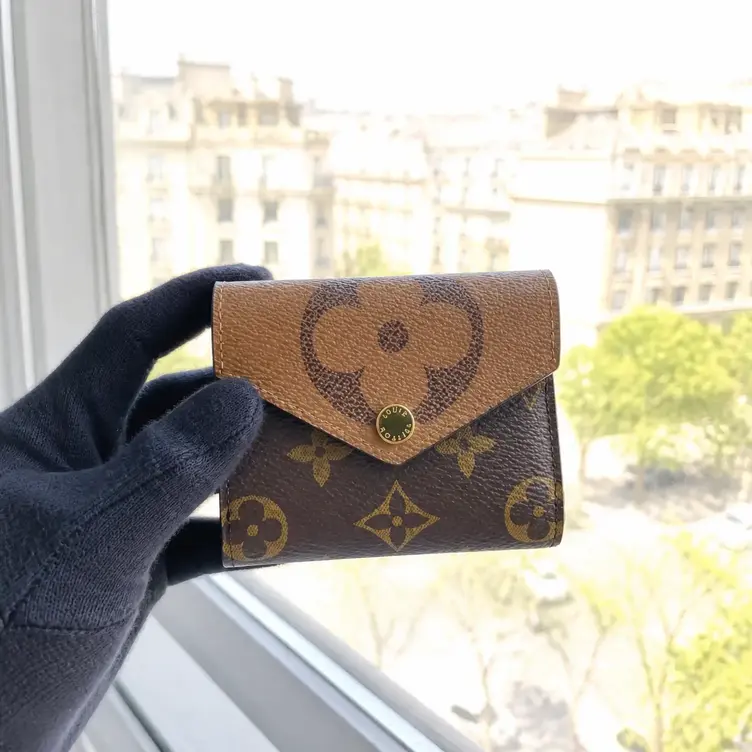 Monogram Reverse Zoe Wallet M80725 photo review