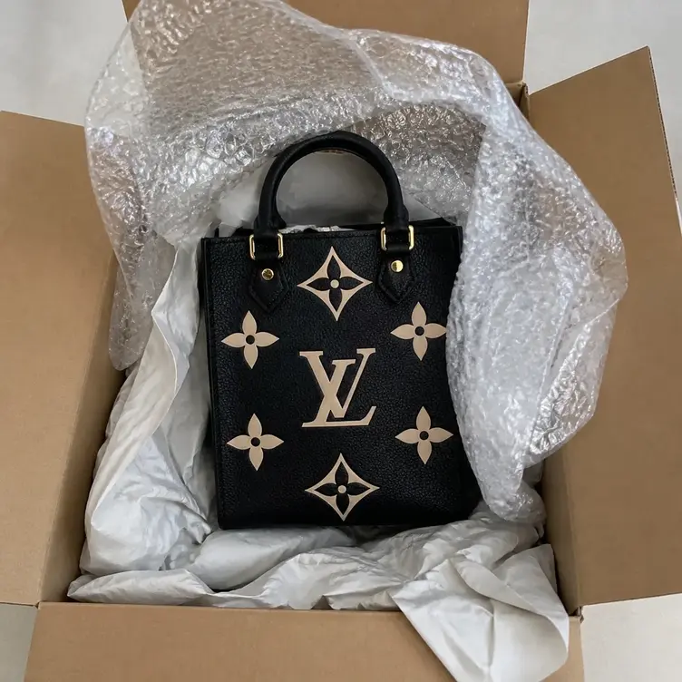 Petit Sac Plat Iconic Bags M81416 photo review