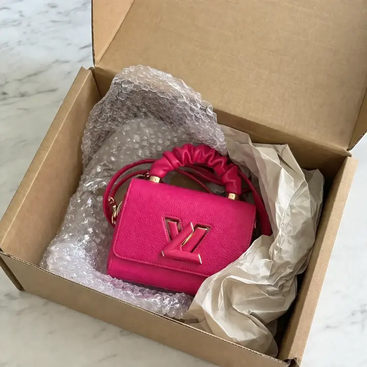 Taurillon Leather Twist PM-Pink M58691 photo review