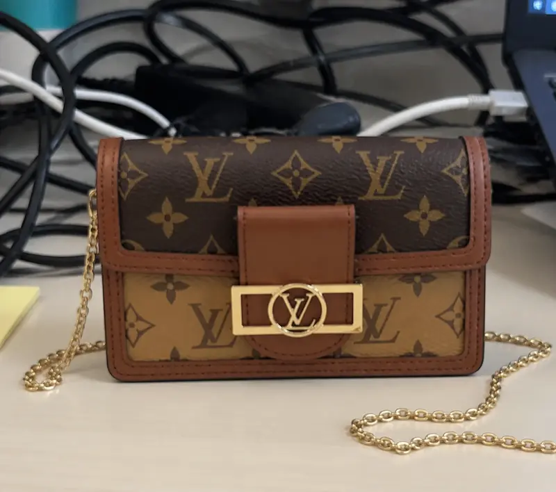 Dauphine Chain Wallet M68746 photo review