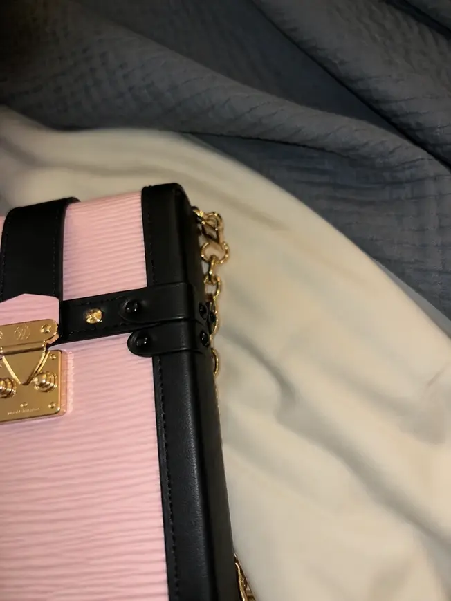 M67872 Epi Vertical Trunk Pochette M67872 photo review