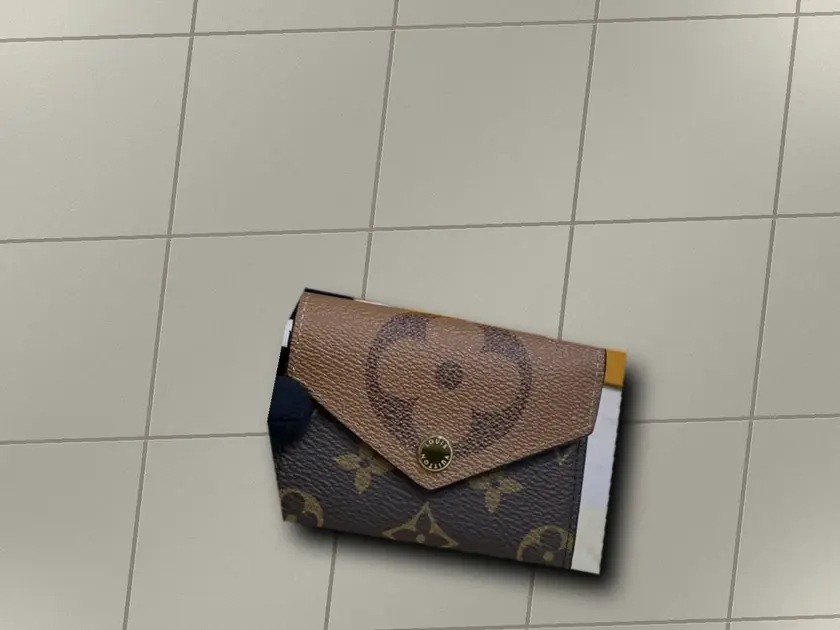 Monogram Reverse Zoe Wallet M80725 photo review