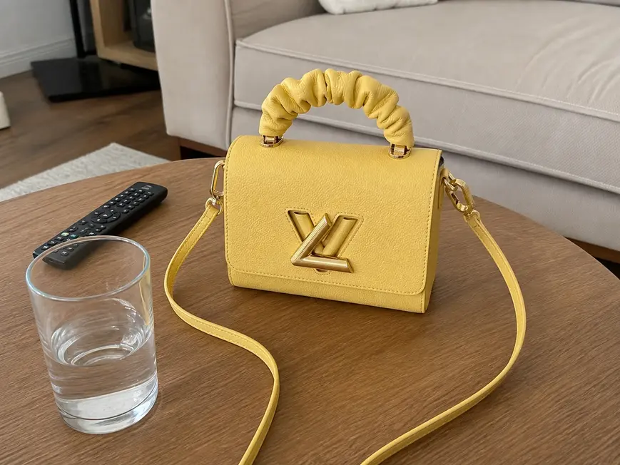 Taurillon Leather Twist PM-Yellow M58571 photo review