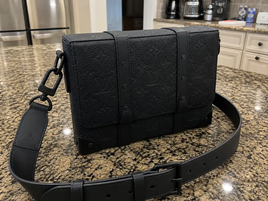 Monogram Embossed black-on-black Soft Trunk bag M55700 photo review