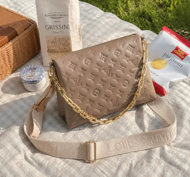 Monogram Embossed Puffy Coussin PM Handbag M59277 photo review