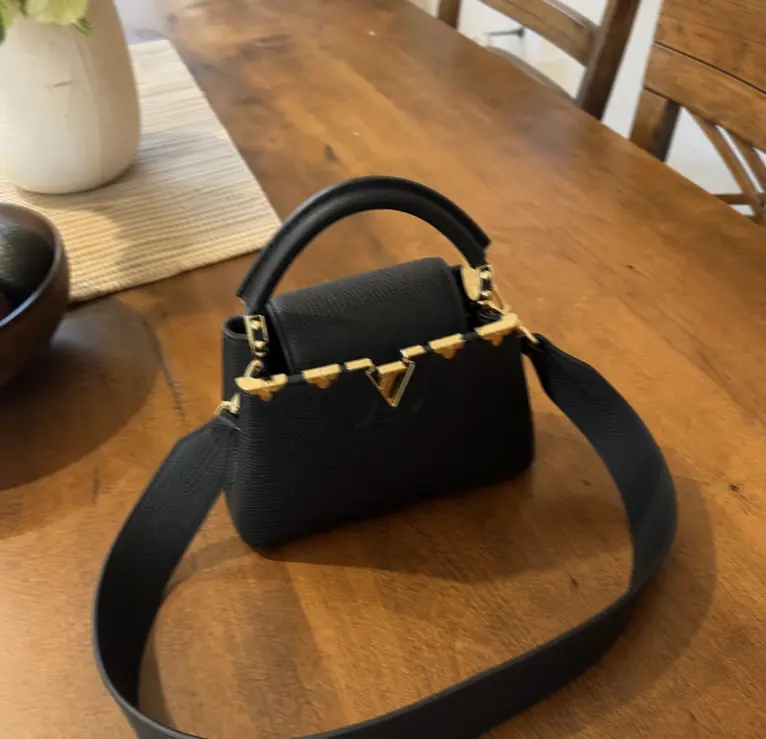 Taurillon Capucines Mini-Black M56669 photo review