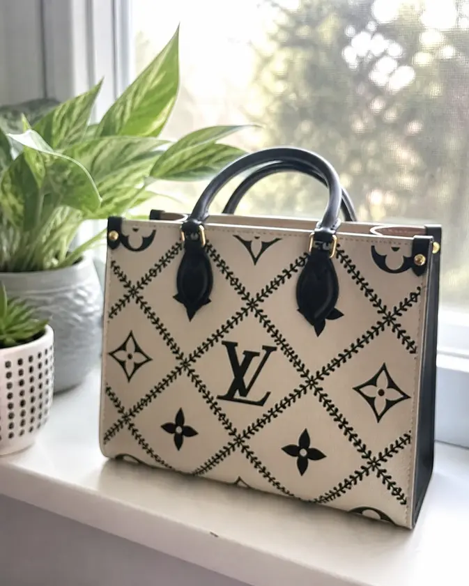 Monogram Empreinte Onthego MM Tote M46016 photo review