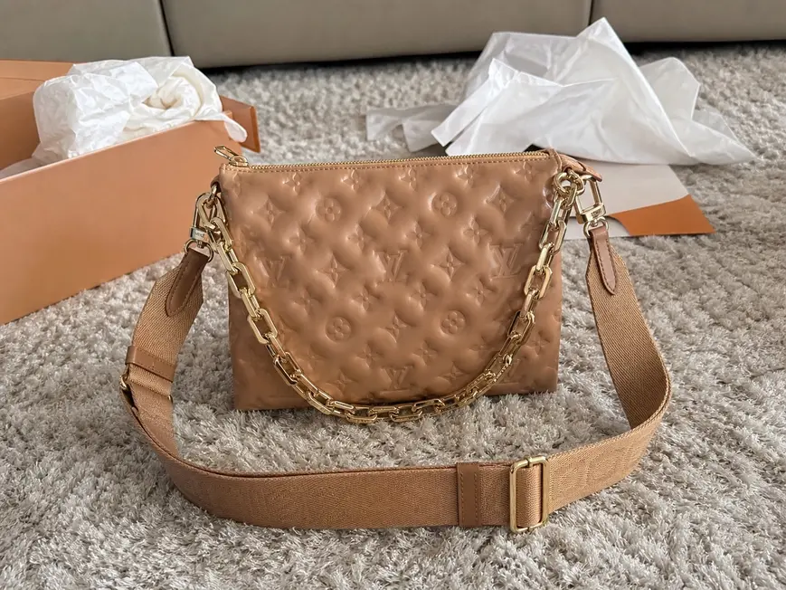 Monogram Embossed Puffy Coussin PM Handbag M57791 photo review