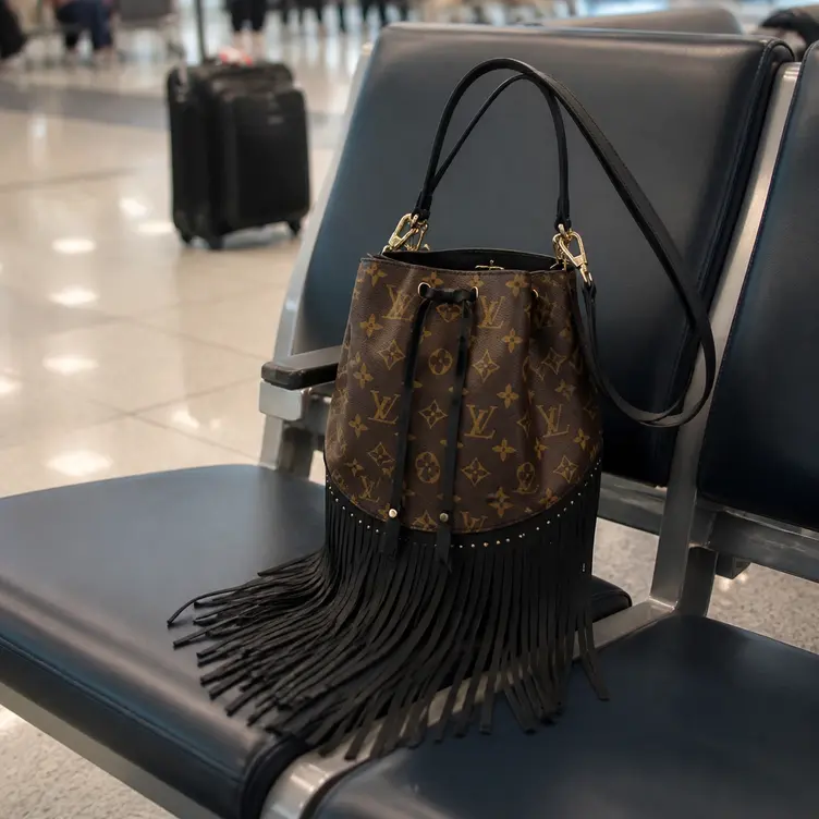 2017 Runway Premium Monogram Fringed Noe Handbag M43132 photo review
