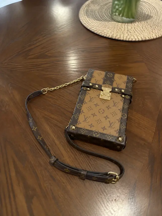 M67873 Monogram Canvas Vertical Trunk Pochette M67873 photo review