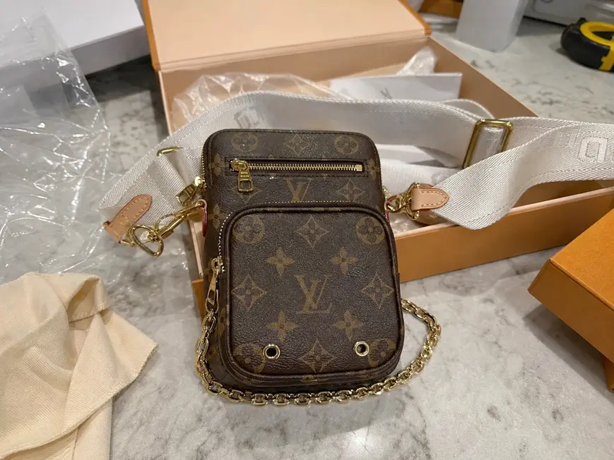 Monogram Canvas Utility Phone Sleeve M80746 photo review