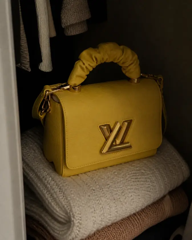 Taurillon Leather Twist PM-Yellow M58571 photo review