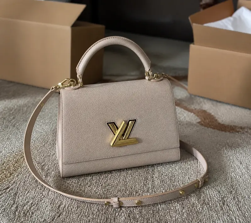 Twist One Handle Handbag M57092 photo review