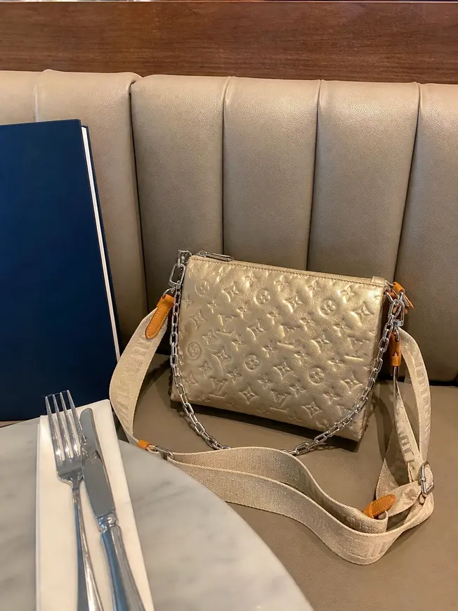 Monogram Embossed Puffy Coussin PM Handbag M59278 photo review