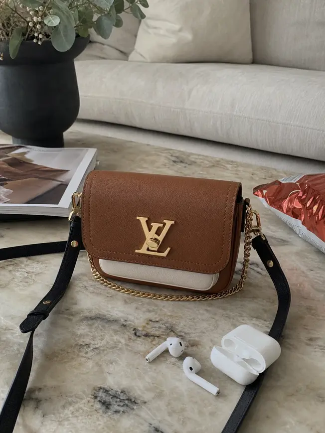 Grained Calf Leather Lockme Tender M59491 photo review