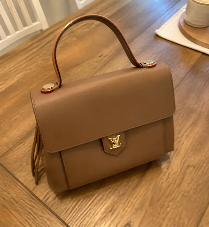 2015 LockMe PM Handbag-Brown M54013 photo review