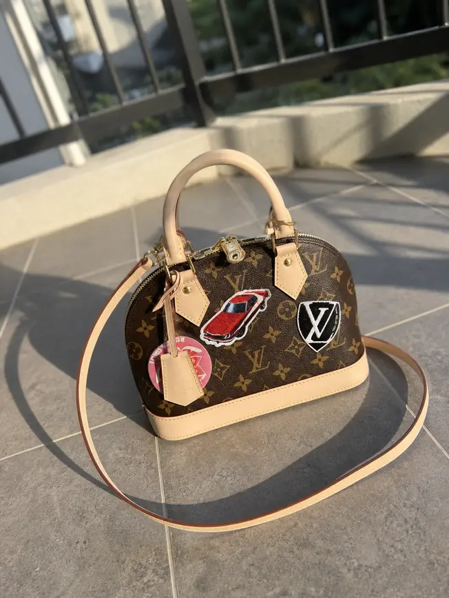 2016 Monogram Canvas World Tour Alma BB M43230 photo review