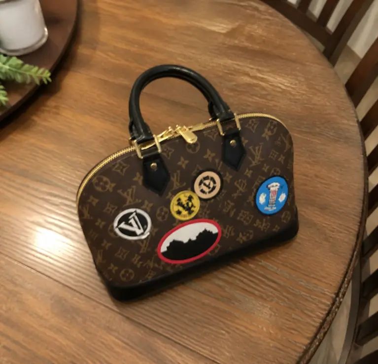 2016 Monogram Canvas Travelers Alma PM M42839 photo review